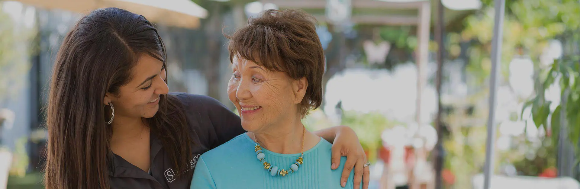 Female Caregiver with female older resident